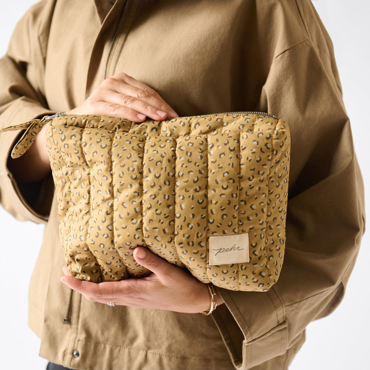 On The Go Pouch- Spotted- Model Holding 