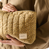 On The Go Pouch- Spotted- Model Holding Up Close