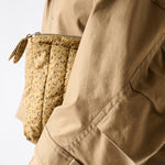 On The Go Pouch- Spotted- Model Holding Under Arm