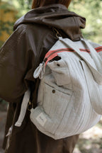 Railroad Convertible Diaper Bag- Model Wearing As Backpack- Up Close- Side Pockets