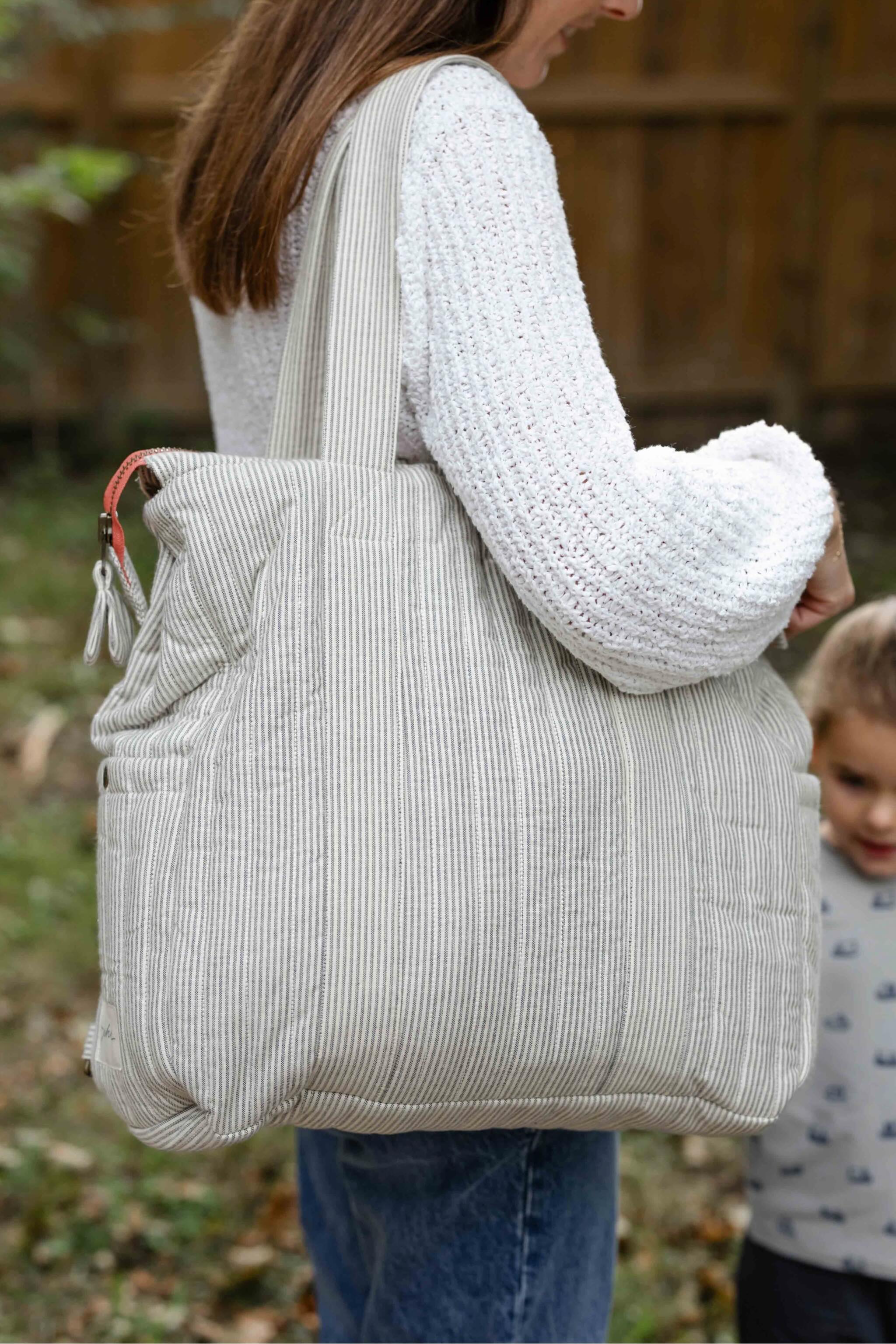 Railroad Convertible Diaper Bag- Model- Side Shot
