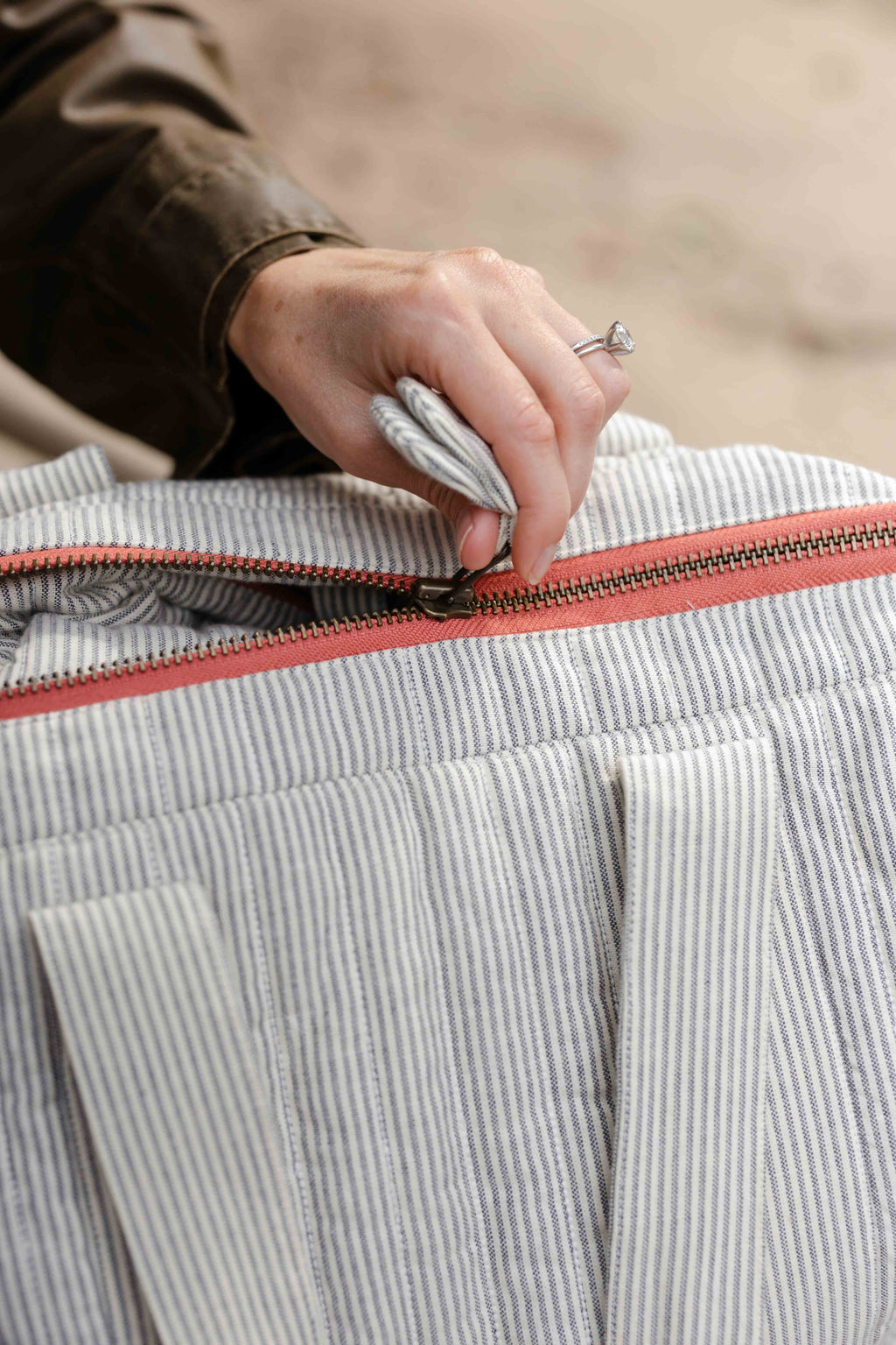 Railroad Convertible Diaper Bag- Up Close Coral Zipper