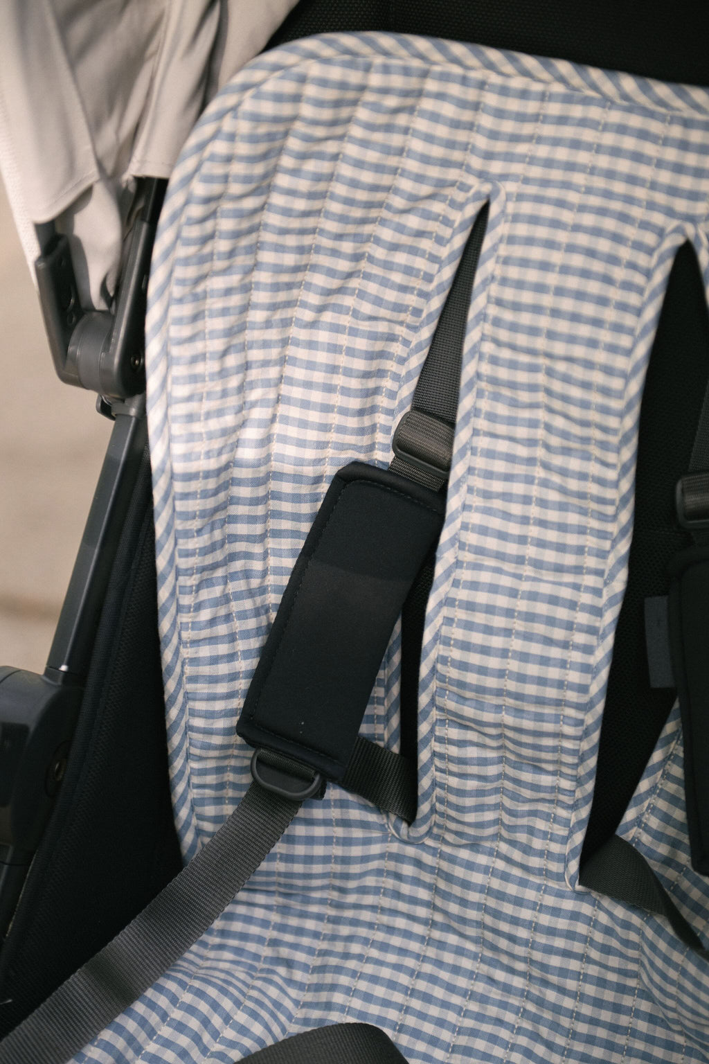 Reversible Stroller Insert - Gingham Harbor/Sherpa- Up Close- In Stroller
