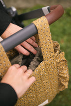 Spotted- Stroller Bag- Up Close- Drawstring Closure- Hanging On Stroller