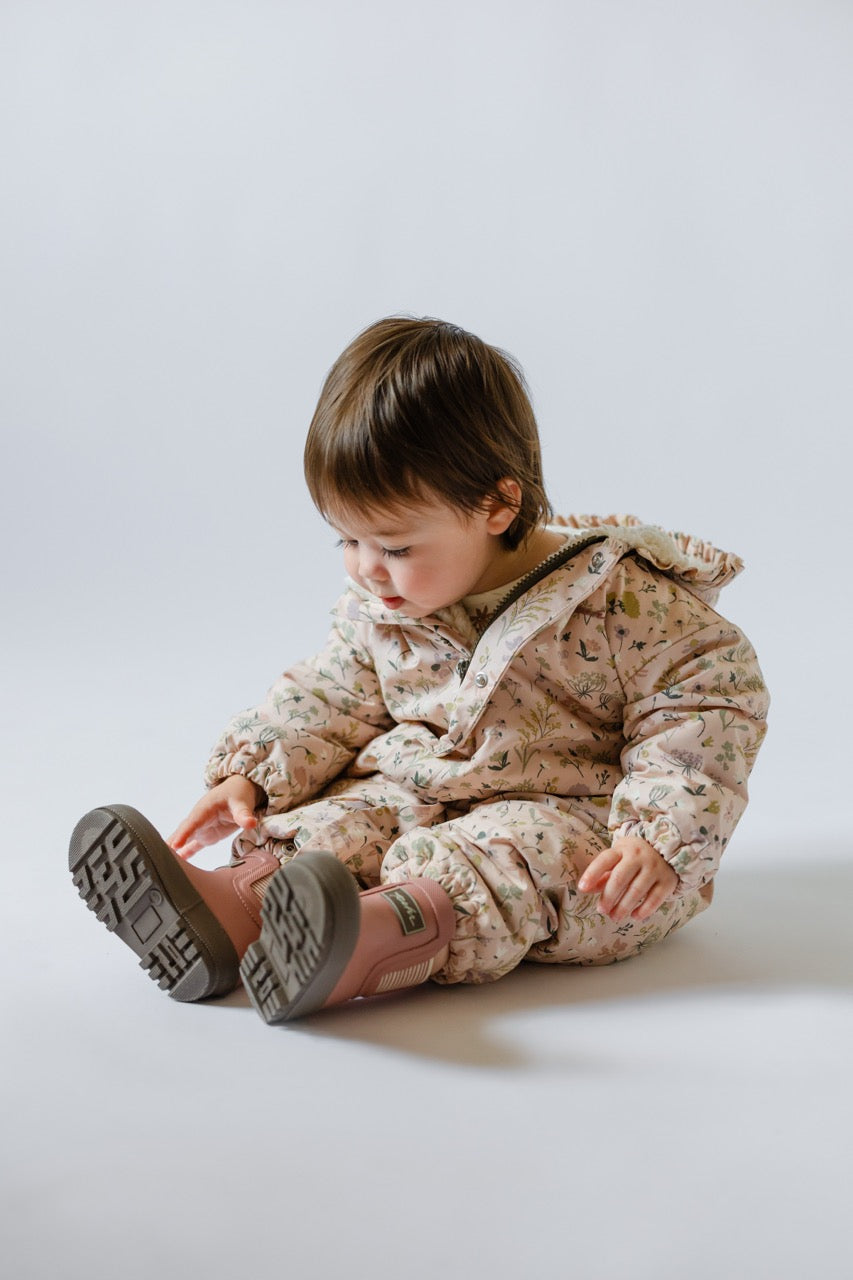 Pathfinder Boot - Wild Rose- Tucked Into Pathfinder Boot- On Toddler- Wildflower Storm Baby Suit