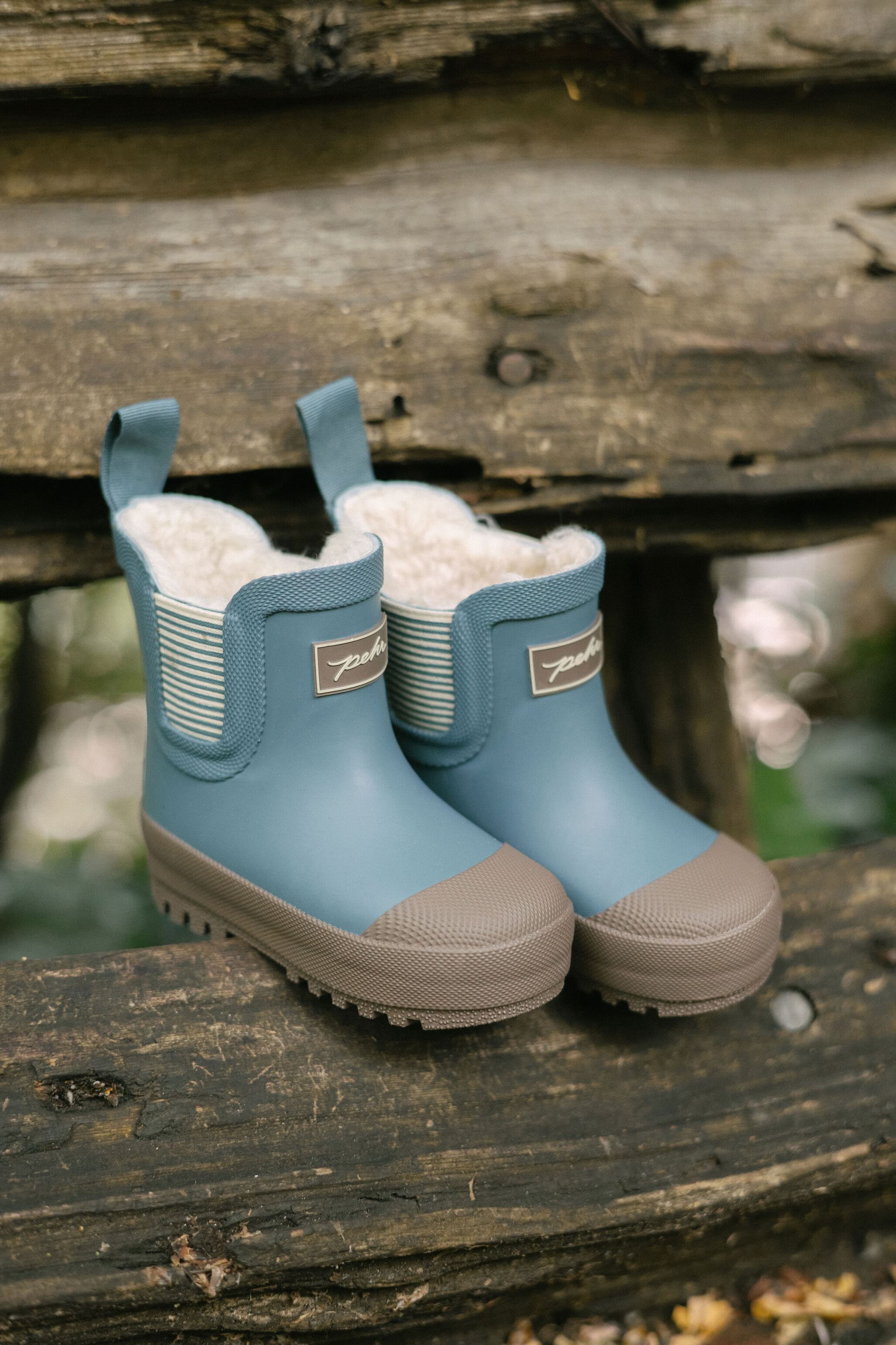 Pathfinder Boot- Slate Blue- Stylized Product Shot- Sherpa Inside