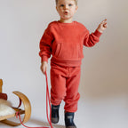 Teddy Fleece Set - Apple- On Toddler- Front Kangaroo Pouch