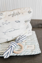 striped on the go portable changing pad stripes away deep sea pehr