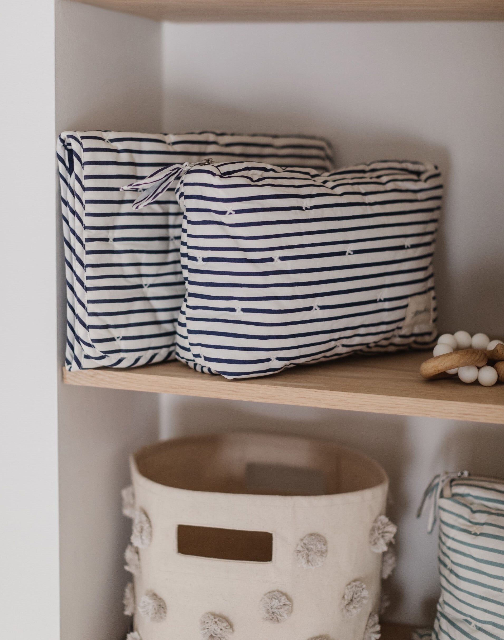 striped on the go portable changing pad stripes away ink blue pehr